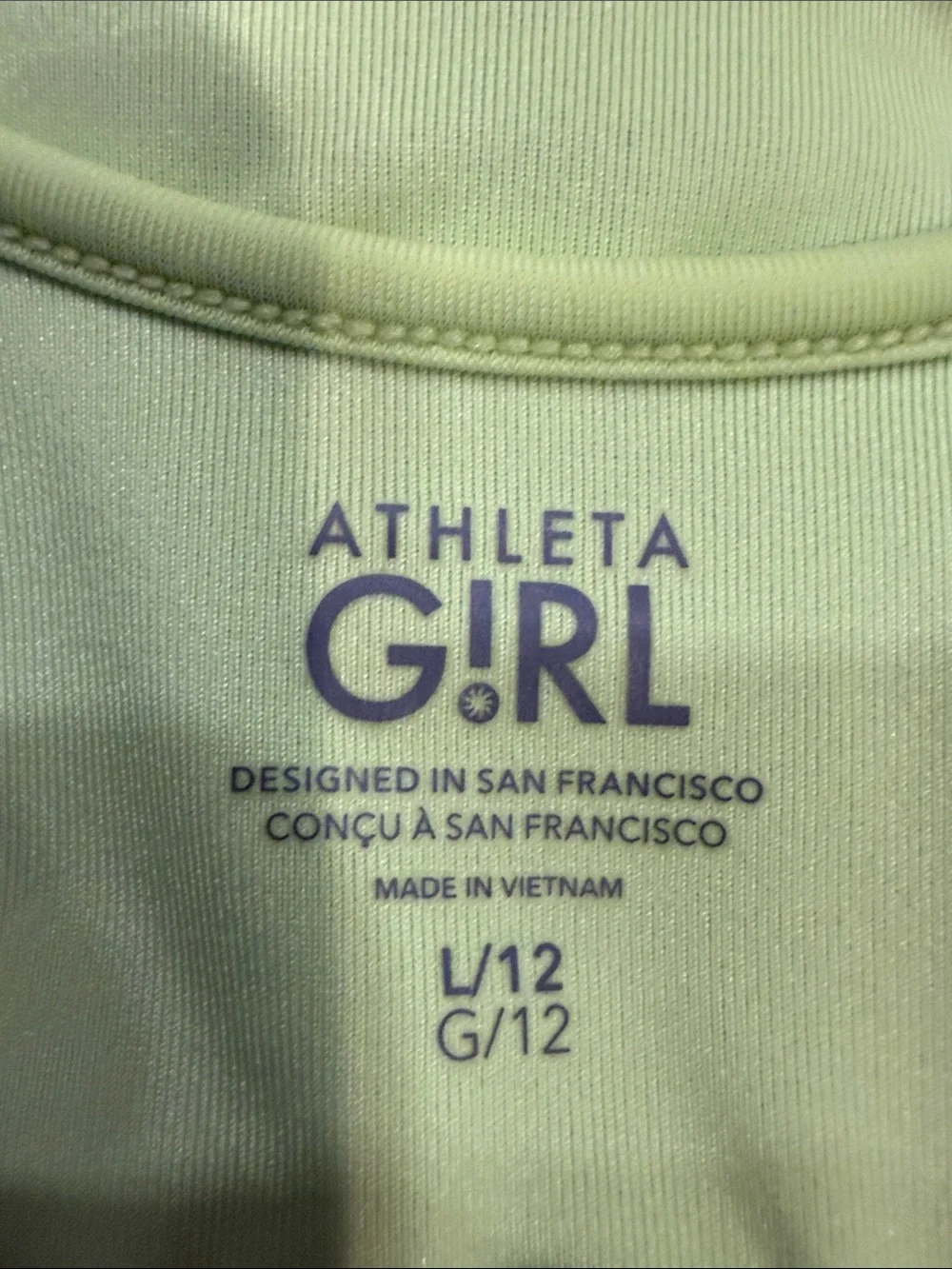 Athleta Girl cutout one pice swimsuit size large (12) .